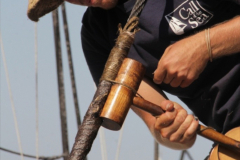 Amistad first mate Scott Spilllias works on the Adventure's rigging